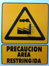 Precaución Área Restringida.